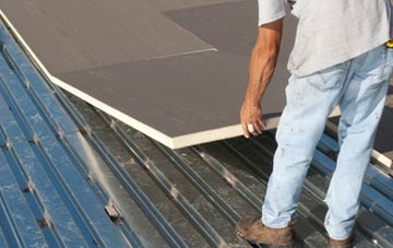 benefits of insulating Pestalozzi International Village flat roofing