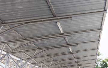 installing Pestalozzi International Village metal roofing